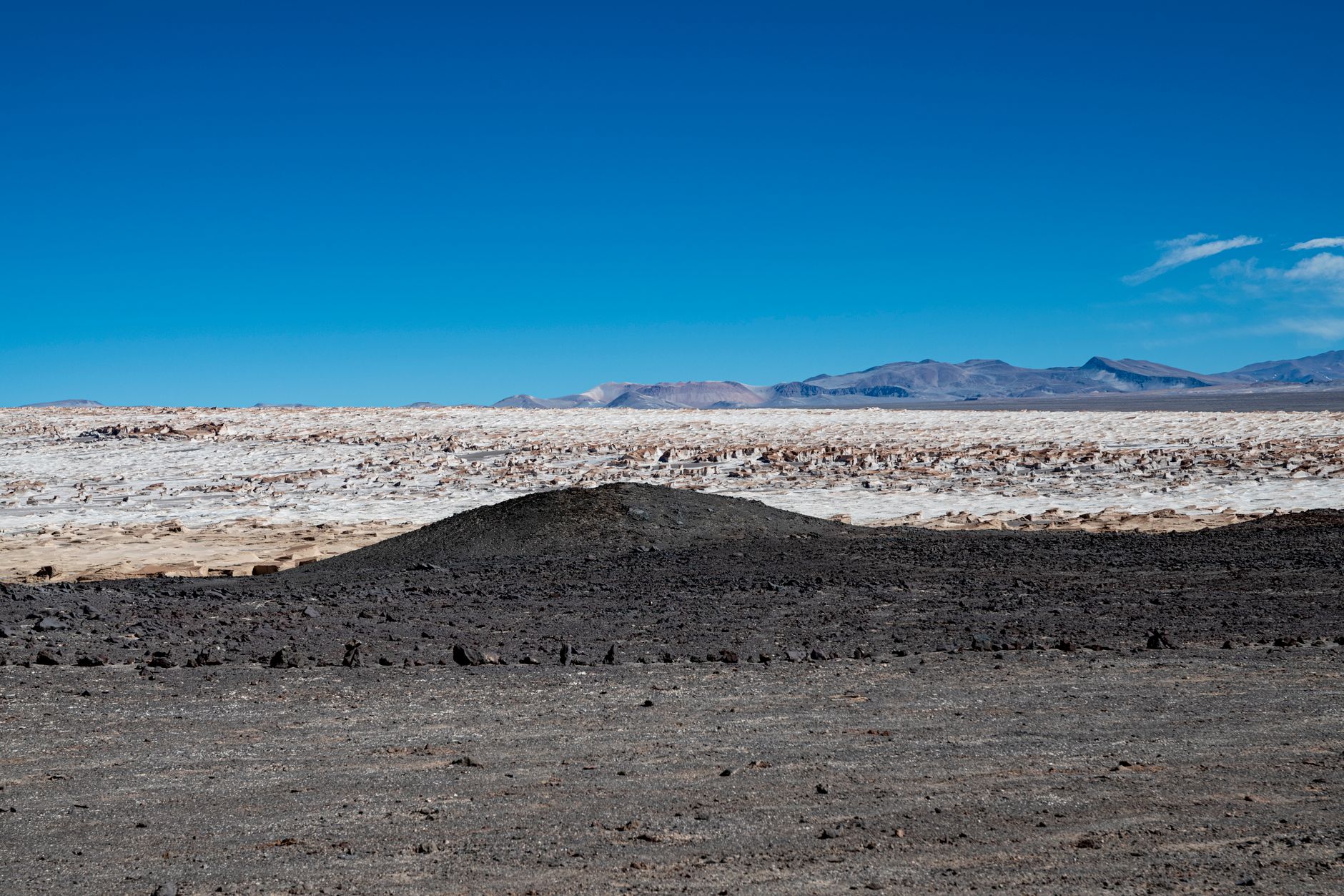 Vast Atacama desert salt landscape with clear blue sky