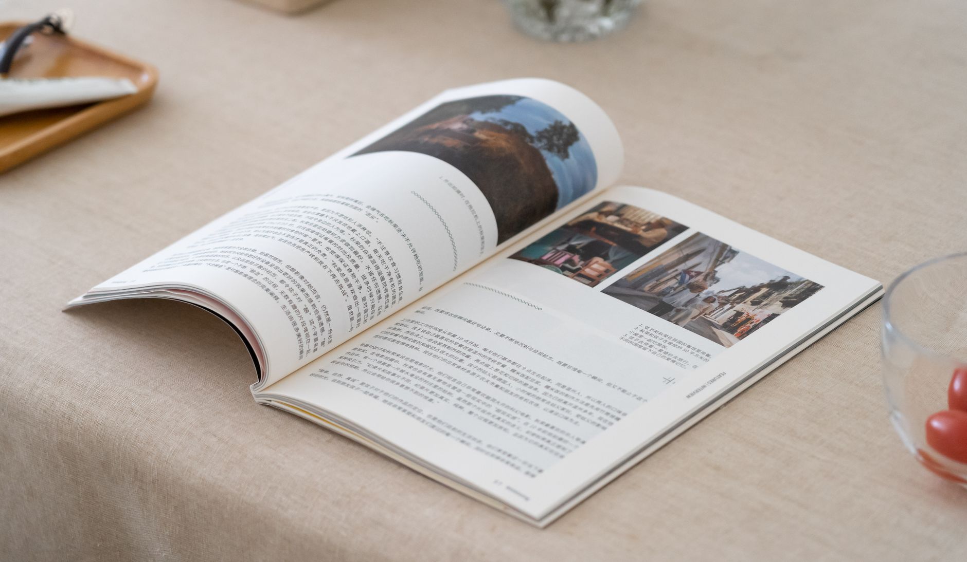 Fine print publication magazines arranged on wooden table